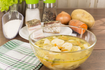 soup with dumplings and ham