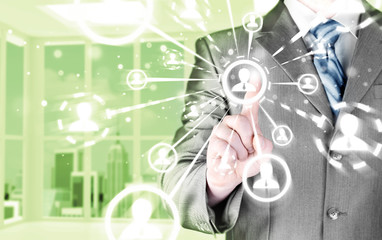 man hand pressing social media icon