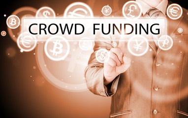 Businessman pushes virtual crowd funding button