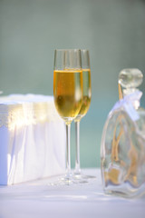 two glasses with champagne standing on the table