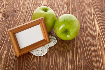 green apple on wooden background
