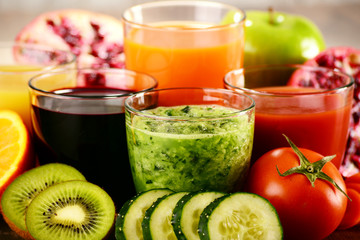 Glasses of fresh organic vegetable and fruit juices