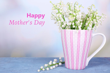 Beautiful flowers in cup