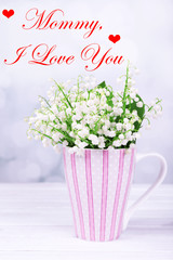 Beautiful flowers in cup