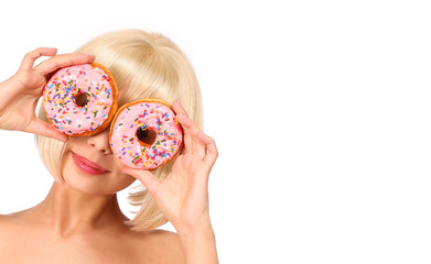 Blonde woman with colorful donuts isolated on white