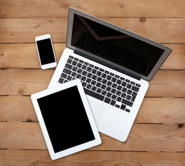 Open notebook, digital tablet and smart phone