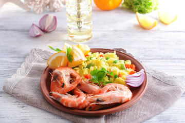 Seafood Paella on plate on table close-up