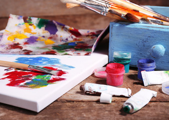 Fototapeta premium Professional art materials on wooden background