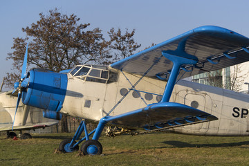 Lightweight white and blue biplane aircrafr