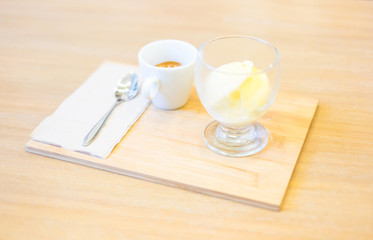 Ice coffee on wood table in coffee shop