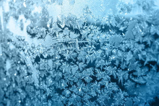 Shiny winter window ice decoration © Sergey Yarochkin