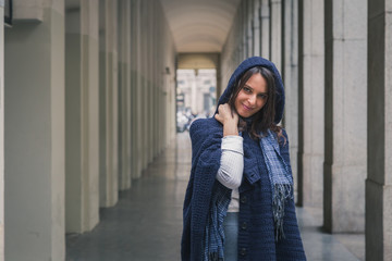 Beautiful girl posing in the city streets