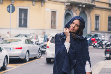 Beautiful girl posing in the city streets