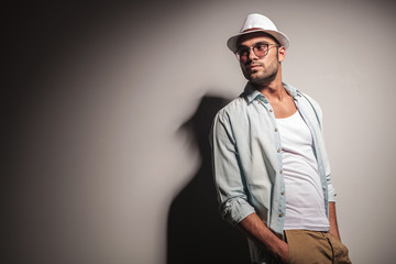 handsome casual man looking away from the camera