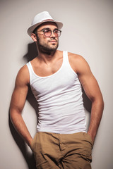 fashion man holding both hands in his pocket