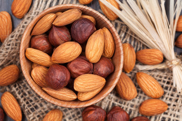 Hazelnut and almonds super food mix in wooden bowl