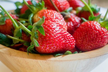 Strawberry in wood basket