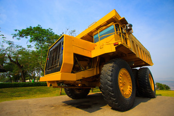 Heavy mining truck in mine and driving along the opencast.