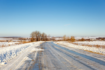 Fototapeta na wymiar Snow-covered road