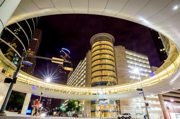 Foto op Plexiglas Skyscrapers at night in downtown of Houston, Texas © f11photo