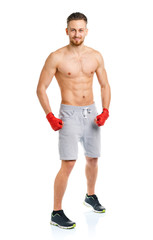 Fototapeta premium Athletic attractive man wearing boxing bandages on the white