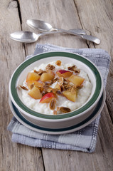 rice pudding with nectarines and roasted almond sliver
