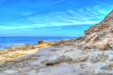 Fototapeta na wymiar rocky shore in Sardinia in hdr