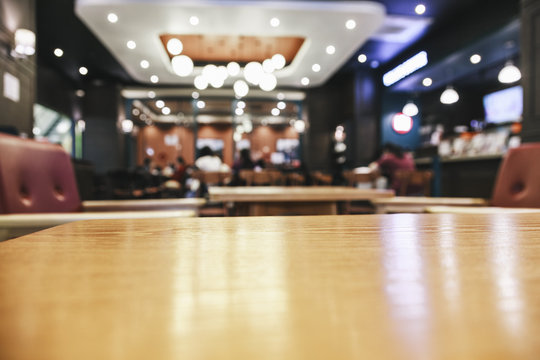 Table top with Blurred Interior Bar Restaurant cafe Perspective