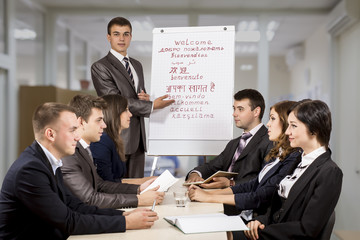 Young corporate coach facilitates the brainstorming