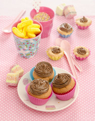 muffins with banana cream filling decorated