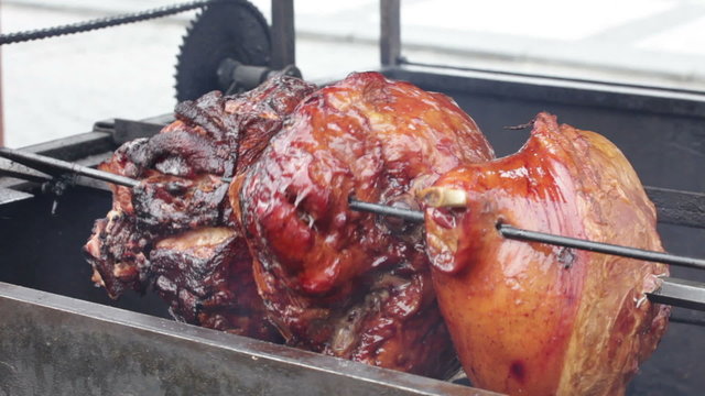 Tasty big pork hough is fried on a spit