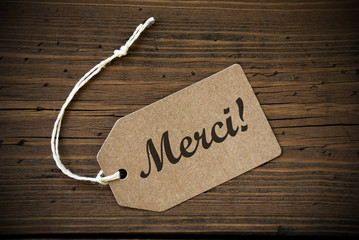 Close Up Of Label With French Text Merci