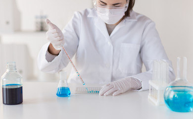 close up of scientist making test in lab