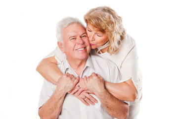 Happy smiling seniors couple in love. Isolated over white