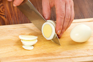 cutting the boiled eggs