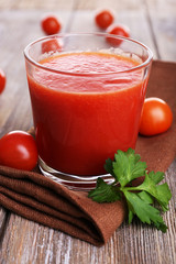Glass of tomato juice with cherry tomatoes