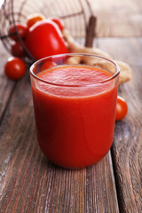 Glass of tomato juice with cherry tomatoes