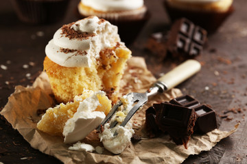 Delicious cupcakes on table close-up