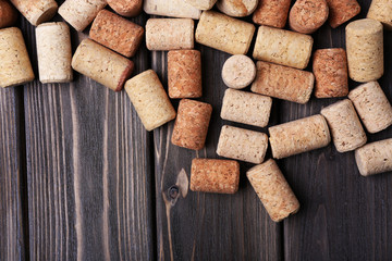 Wine corks on wooden background