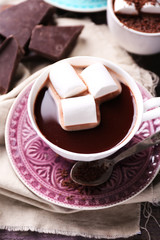 Hot chocolate with marshmallows in mug,