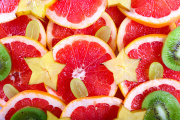 Fototapety  Sliced fruits background