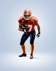 Fotobehang American football player in action white isolated © 103tnn