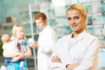 Fototapeta na wymiar pharmacy chemist woman in drugstore