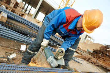 worker cutting rebar by grinding machine