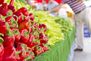 red sweet peppers on market
