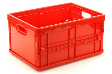  foldable red plastic storage box on a white background