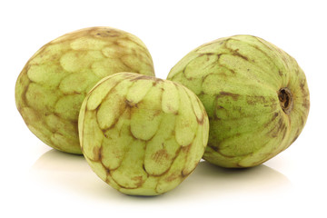 fresh cherimoya fruits (Annona cherimola) on a white background