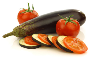 sliced and mixed  tomato and Suriname aubergine (eggplant)