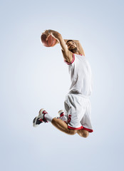 Fototapeta premium Basketball player is spinning on his finger