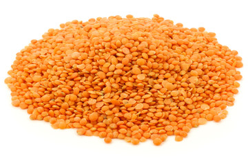 red lentils on a white background